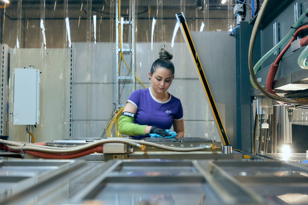 woman working in production at 4a manufacturing